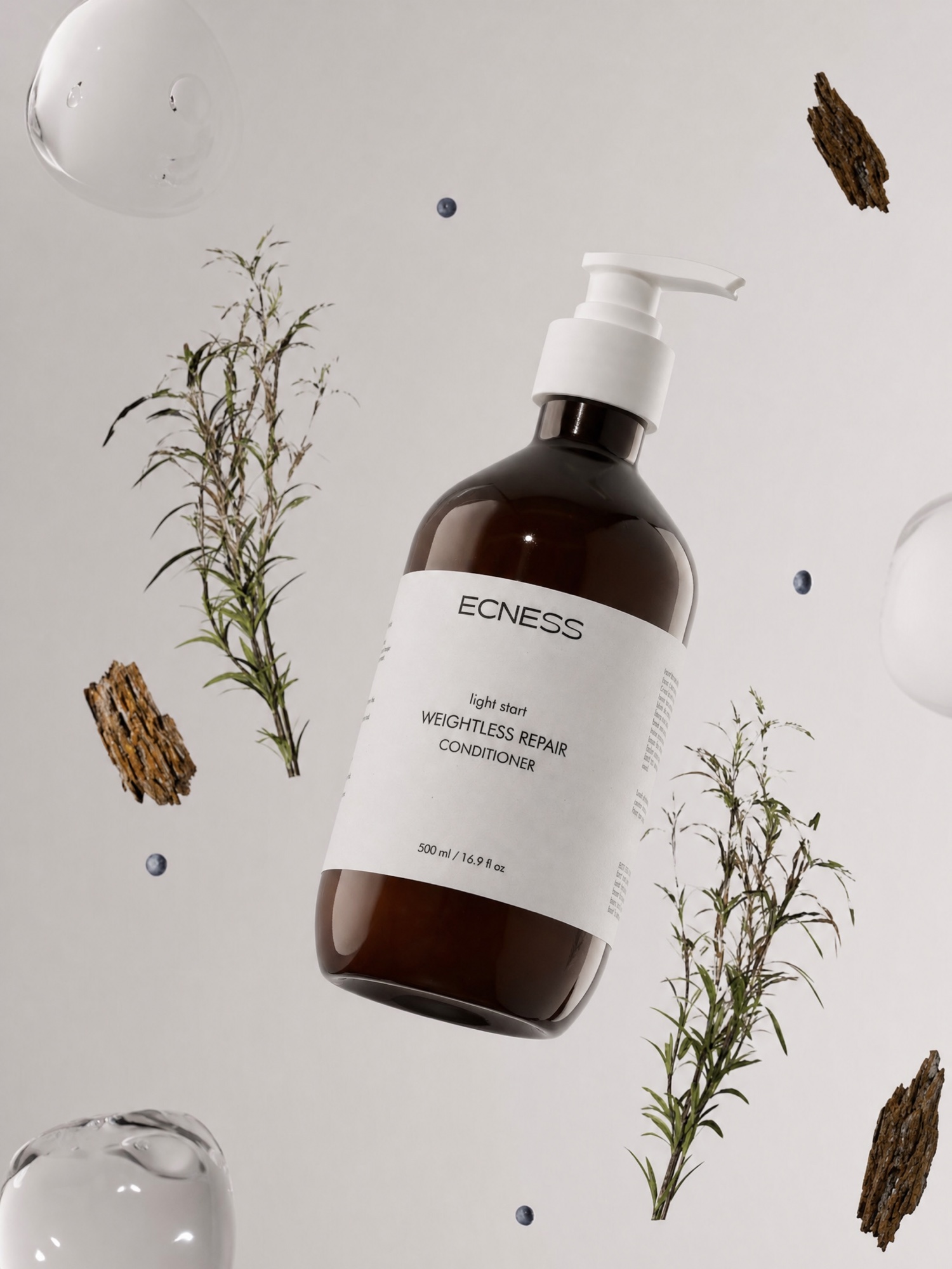 ECNESS Weightless Repair Conditioner in a botanical setting